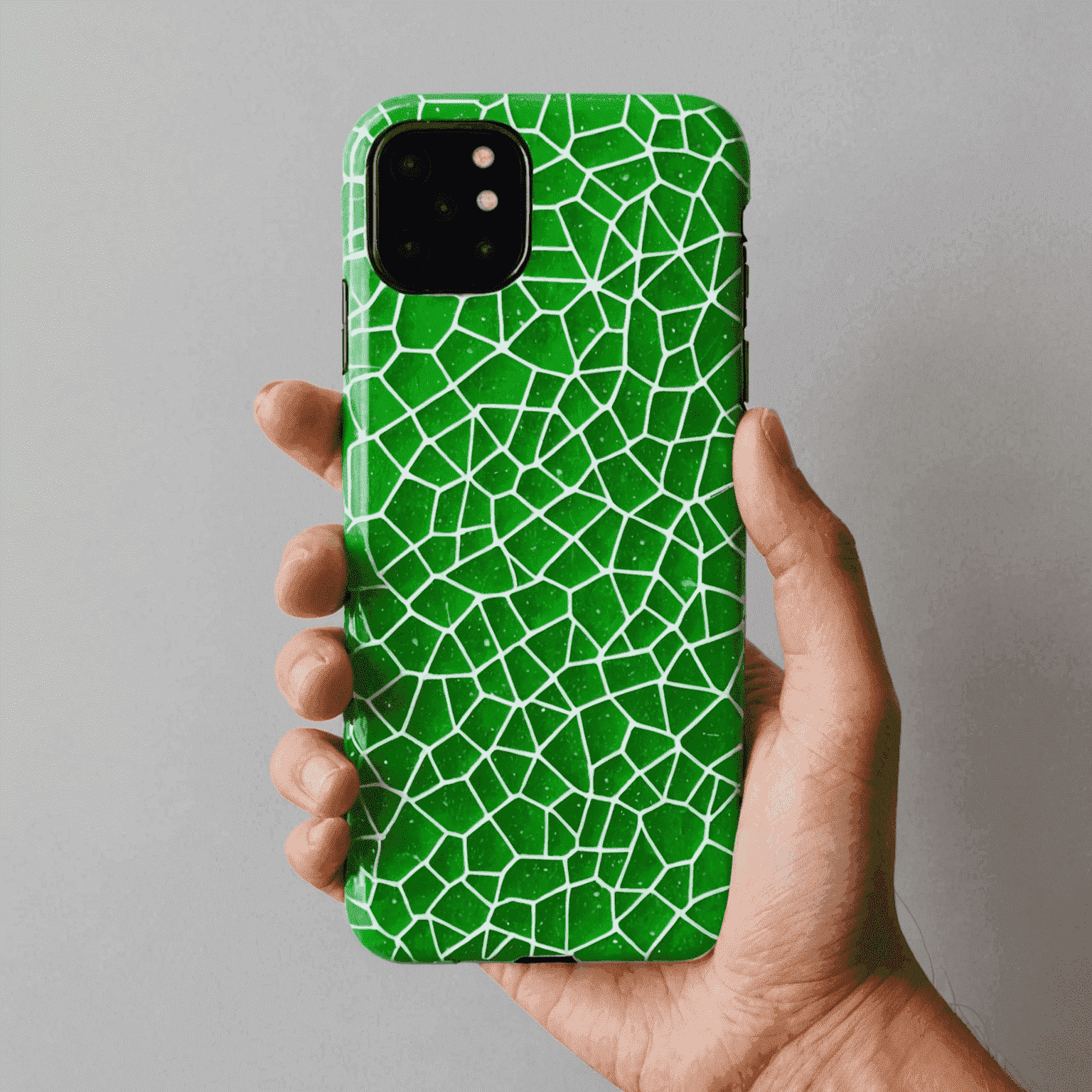 Neon green phone case with a salt crystal pattern, showcasing durability and style